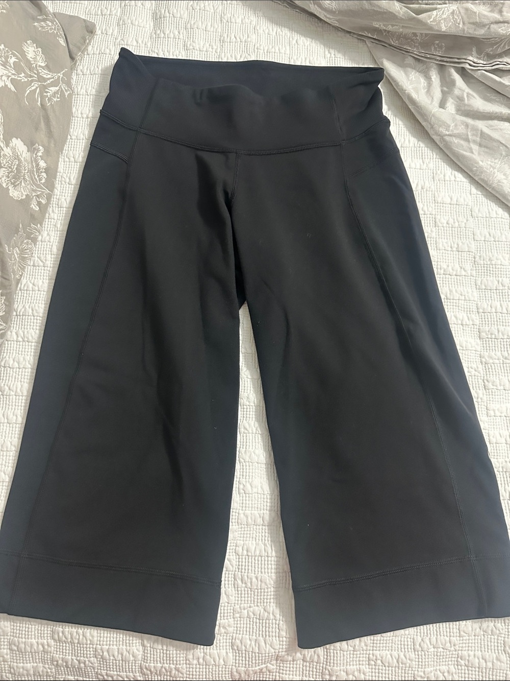 Lululemon black wider leg capris size 4